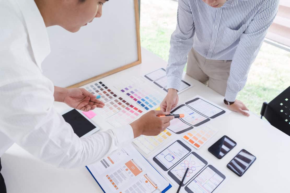 creative designer looking at colour samples
