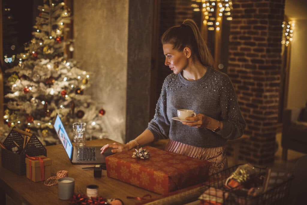 Women working on her laptop on christmas