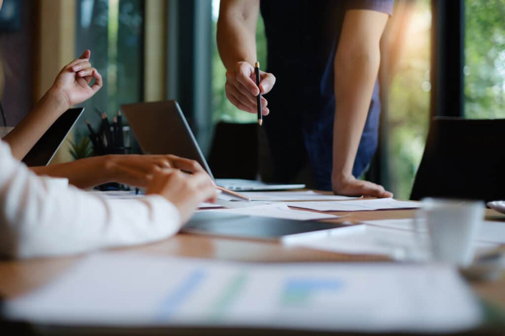 Cropped image of hands on a table during a business meeting