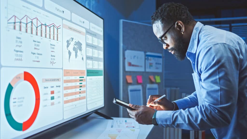 A man looking at marketing data analytics.